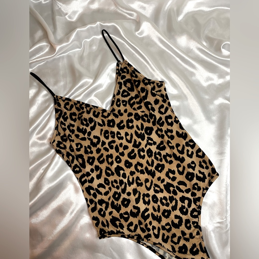 Forever 21 Cheetah Body Suit. Size: S